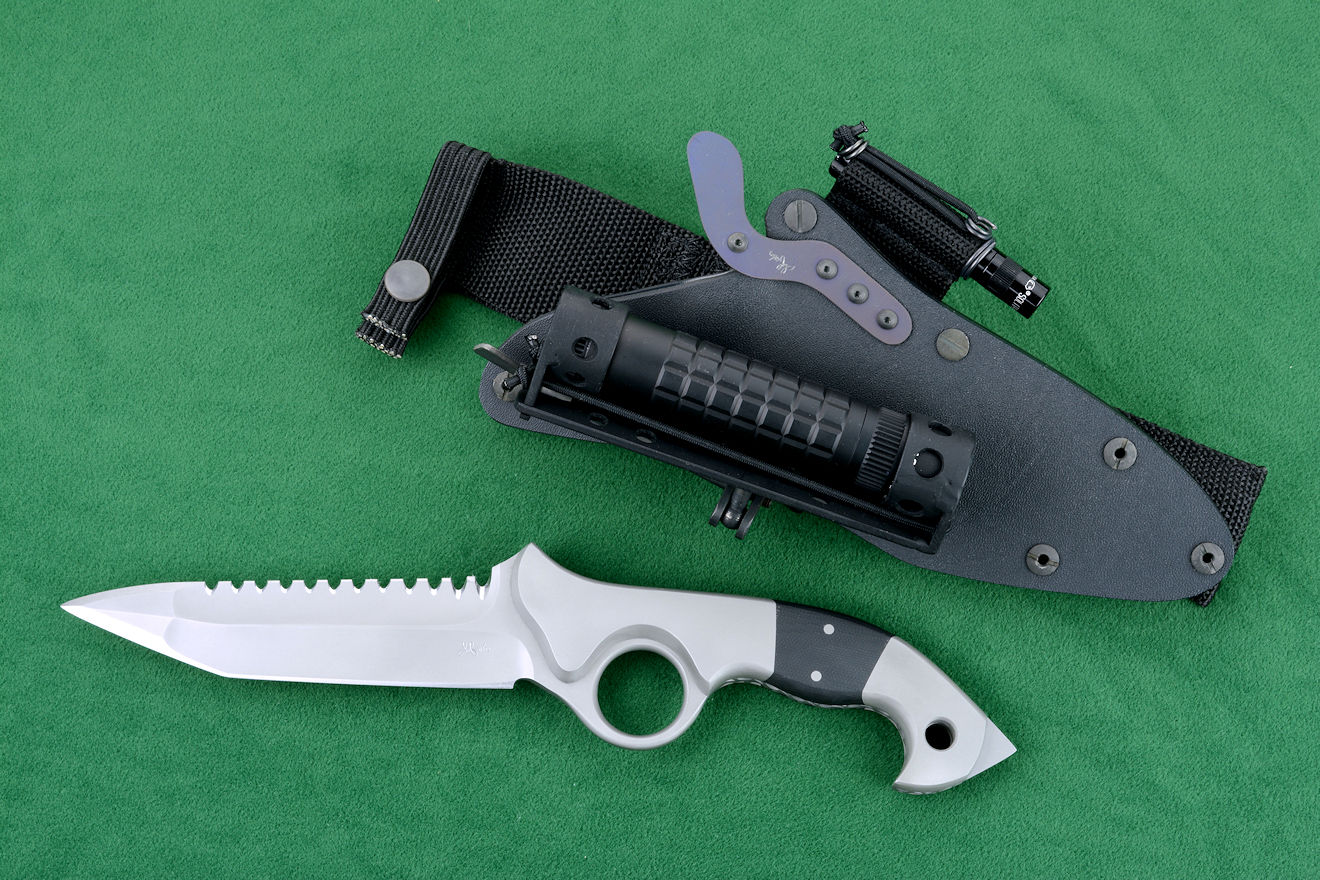 "Ari B' Lilah" Custom Counterterrorism Tactical Combat Knife, obverse side view in ATS-34 high molybdenum-chromium martensitic stainless steel blade, 304 stainless steel bolsters, black G10 composite handle, hybrid tension-locking sheath in kydex, anodized black aluminum alloy, titanium, blackened stainless steel fasteners, anodized hardware and mounts, HULA with MagTac flashlight, LIMA with Maglite LED Solitaire, Ultimate belt loop extender with diamond pad sharpener "Ari B' Lilah" Custom Counterterrorism Tactical Combat Knife, obverse side view in ATS-34 high molybdenum-chromium martensitic stainless steel blade, 304 stainless steel bolsters, black G10 composite handle, hybrid tension-locking sheath in kydex, anodized black aluminum alloy, titanium, blackened stainless steel fasteners, anodized hardware and mounts, HULA with MagTac flashlight, LIMA with Maglite LED Solitaire, Ultimate belt loop extender with diamond pad sharpener