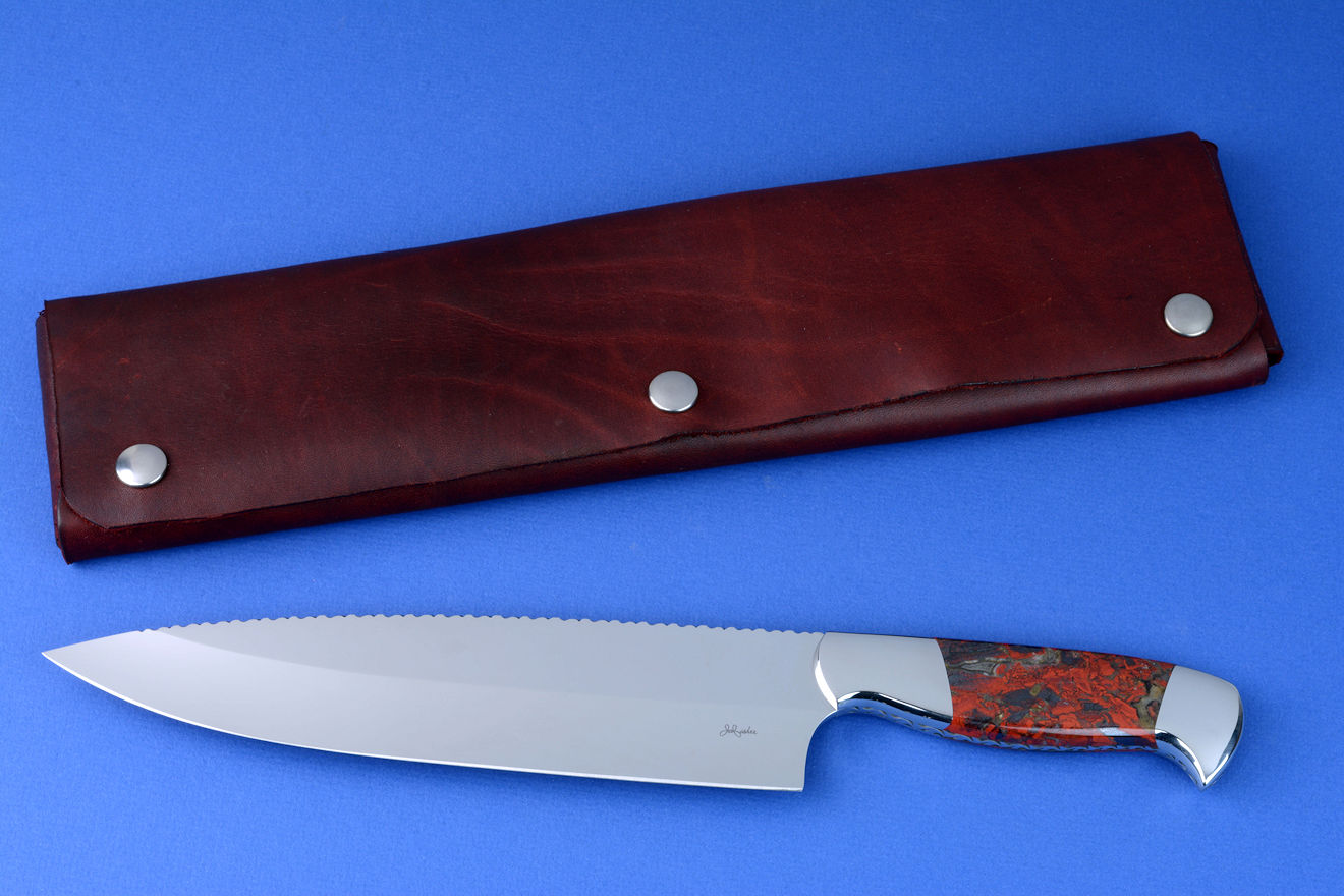 "Concordia" fine master chef's knife, obverse side view in CPM154CM high molybdenum powder metal technology tool steel blade, 304 stainless steel bolsters, Brecciated African Jasper gemstone handle, chef's roll case in latigo side leather and leather shoulder, hand-tooled, hand stitched with stainless steel snaps "Concordia" fine master chef's knife, obverse side view in CPM154CM high molybdenum powder metal technology tool steel blade, 304 stainless steel bolsters, Brecciated African Jasper gemstone handle, chef's roll case in latigo side leather and leather shoulder, hand-tooled, hand stitched with stainless steel snaps