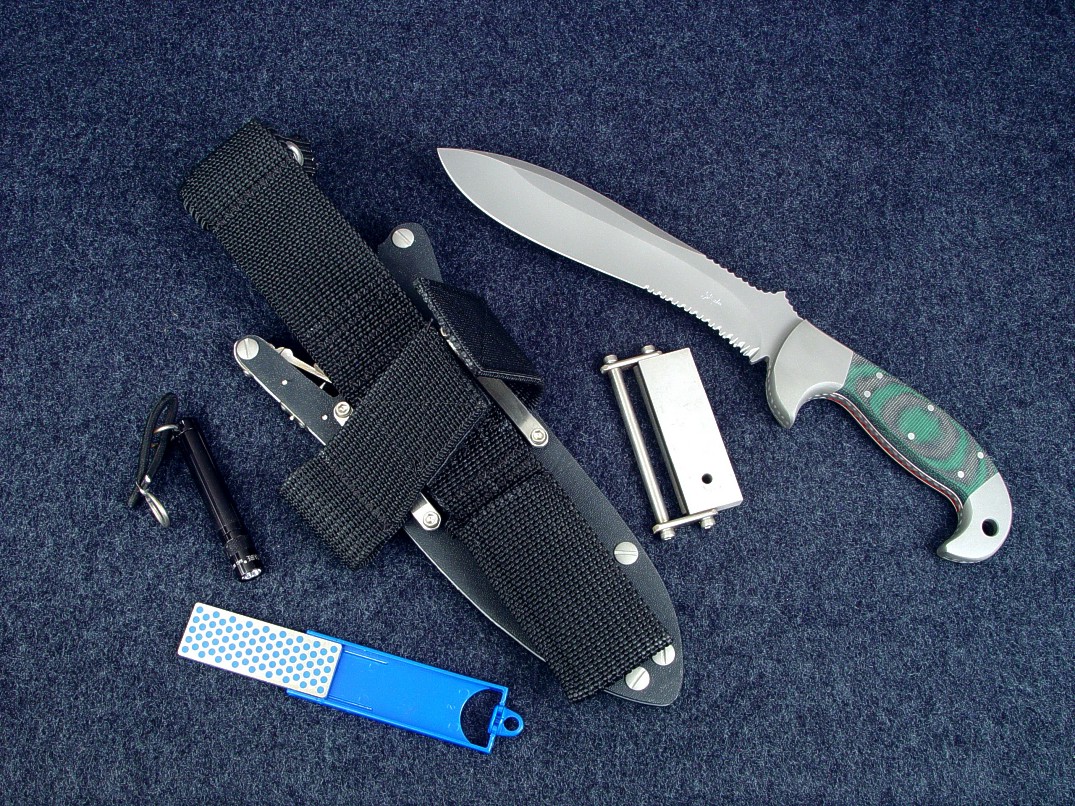 Hania, with ultimated belt loop extender accessory package including diamond pad sharpener, magnesium/firesteel fire starter, Maglite solitaire flashlight Hania, with ultimated belt loop extender accessory package including diamond pad sharpener, magnesium/firesteel fire starter, Maglite solitaire flashlight