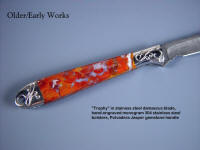 "Trophy" in stainless steel damascus blade, hand-engraved 304 stainless steel bolsters, Polvadera Jasper gemstone handle, hand-tooled leather sheath
