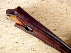 "Argiope" sheath edge detail. Multiple welt sheath is thick, stout, and strong, with welts over 3/4" thick at mouth. "Argiope" sheath edge detail. Multiple welt sheath is thick, stout, and strong, with welts over 3/4" thick at mouth.