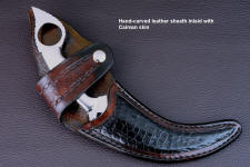 "Raptor" sheathed view in CPM154CM powder metal technology high molybdenum stainless steel blade, 304 stainless steel bolsters, Peruvian Lapis Lazuli gemstone handle, hand-carved leather sheath inlaid with Caiman skin